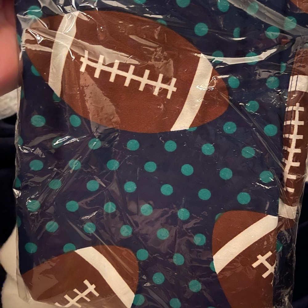New in package! LuLaRoe Football leggings size TC